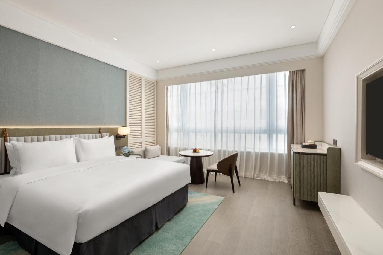 Xiamen International Seaside Hotel -Hotel Corridor Leads To The Stone Exhibition Hall Eksteriør billede