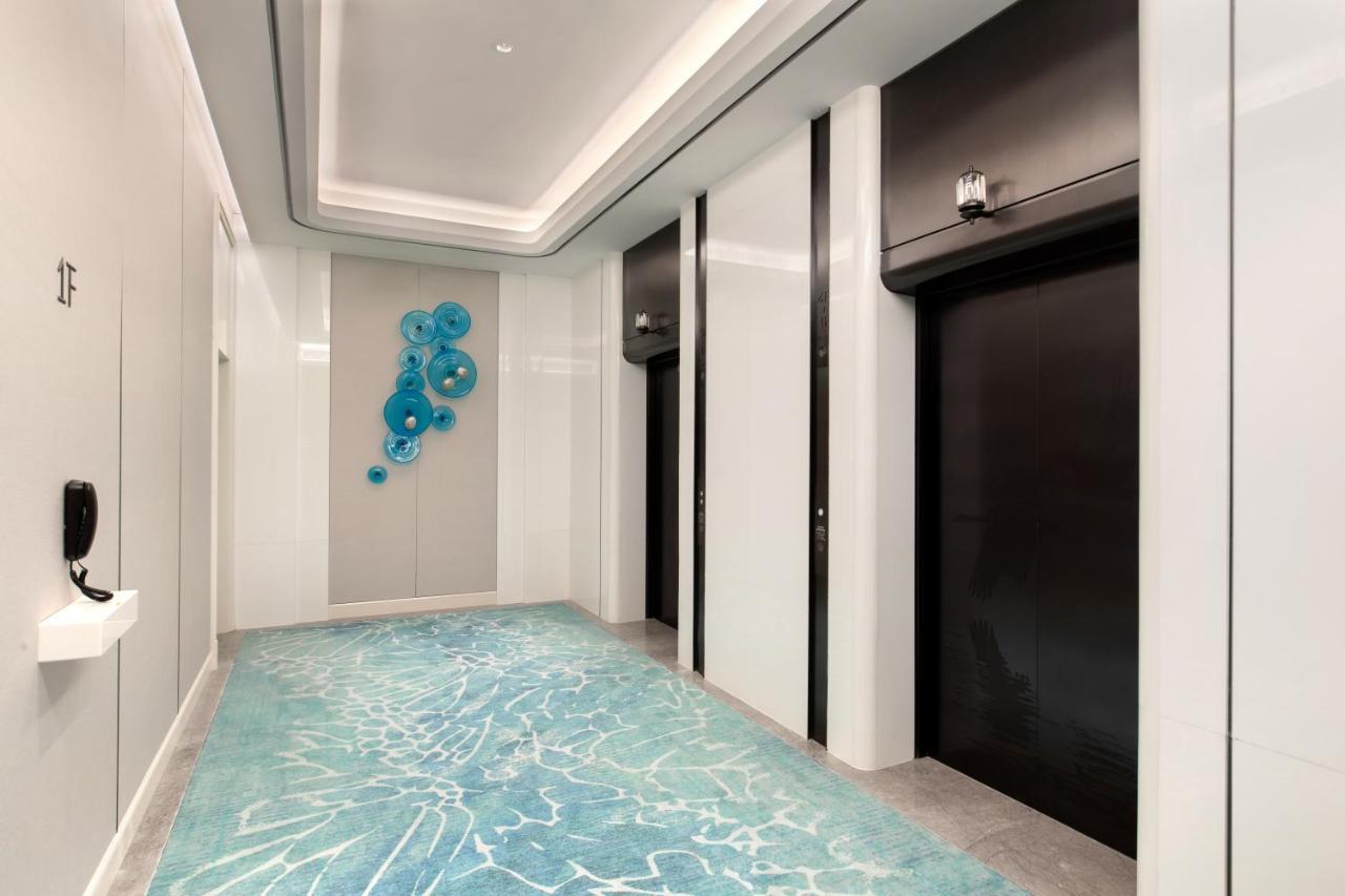 Xiamen International Seaside Hotel -Hotel Corridor Leads To The Stone Exhibition Hall Eksteriør billede