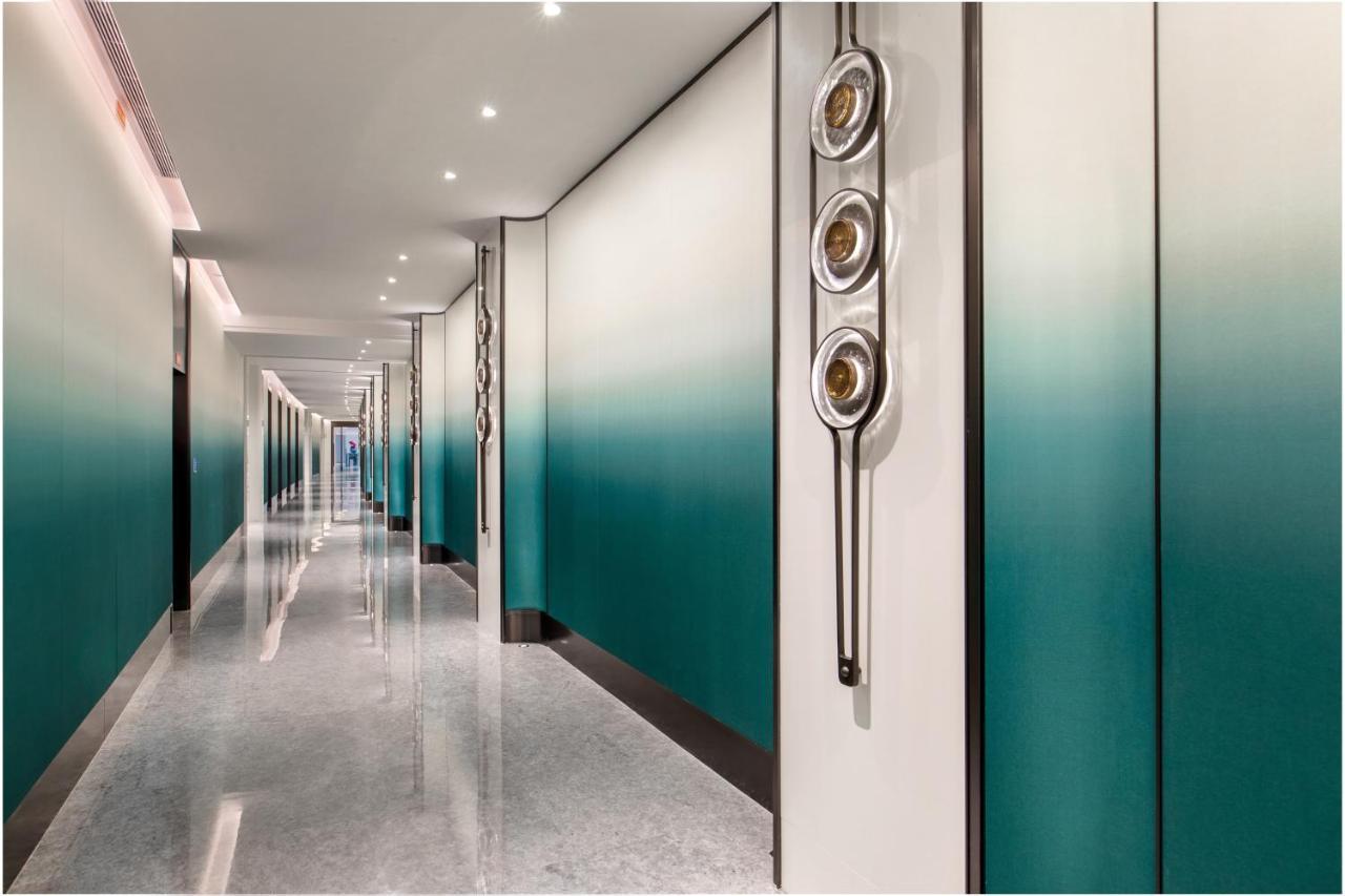 Xiamen International Seaside Hotel -Hotel Corridor Leads To The Stone Exhibition Hall Eksteriør billede